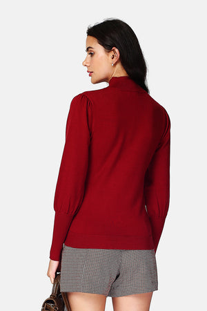 Pullover mit hohem Ausschnitt, langen Ärmeln, vorne leicht gebauscht, transparent