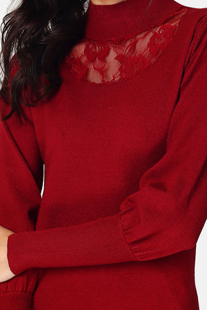 Sweater with high neckline, long sleeves, slightly puffy in the front, transparent