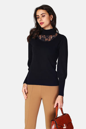 Sweater with high neckline, long sleeves, slightly puffy in the front, transparent