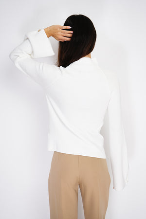 High-neck ribbed sweater with buttons on long sleeves