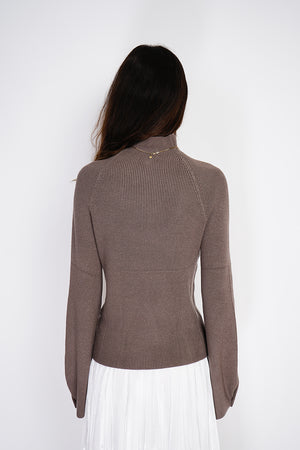 High-neck ribbed sweater with buttons on long sleeves