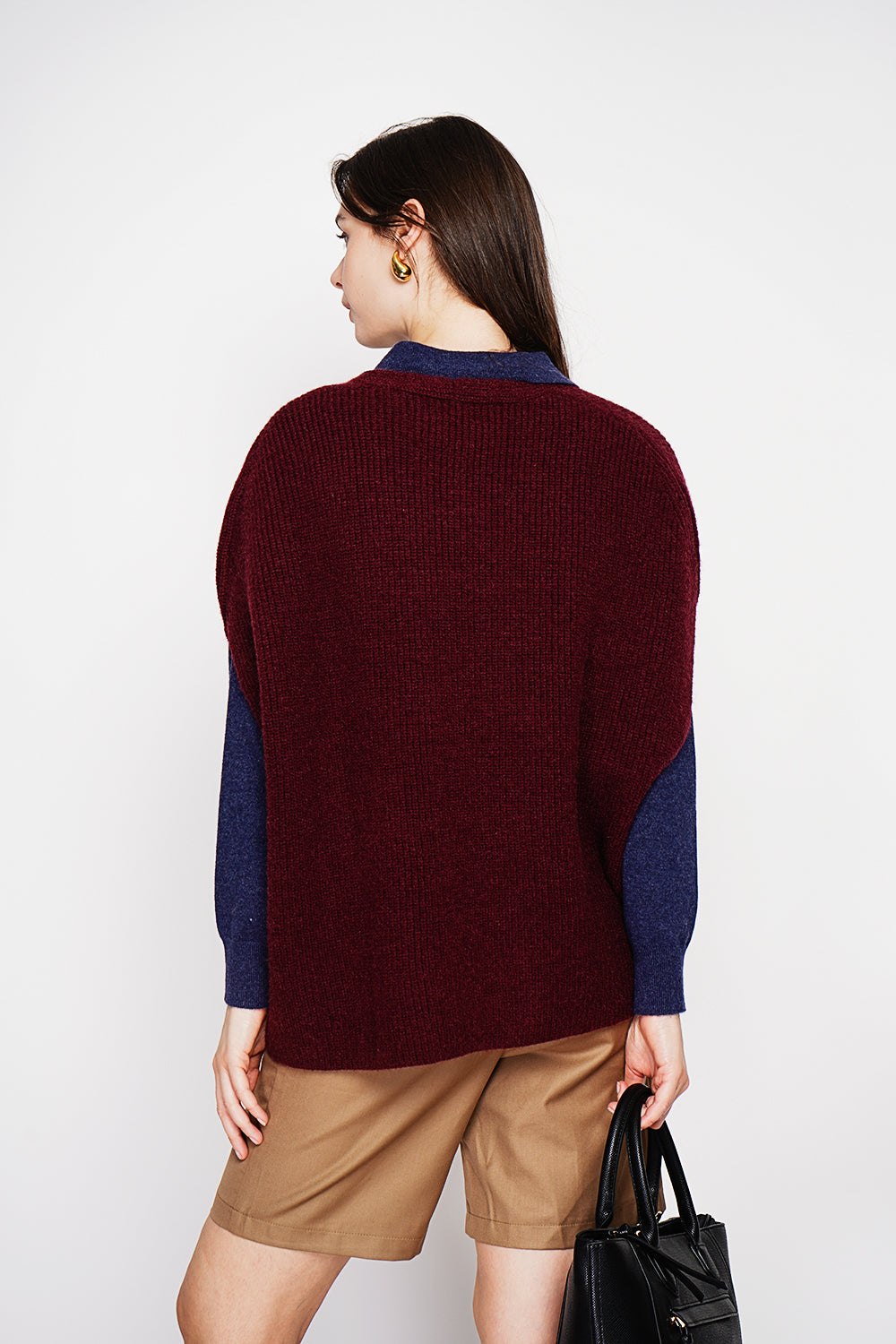 V-neck poncho sweater with fancy knit and oversized cut