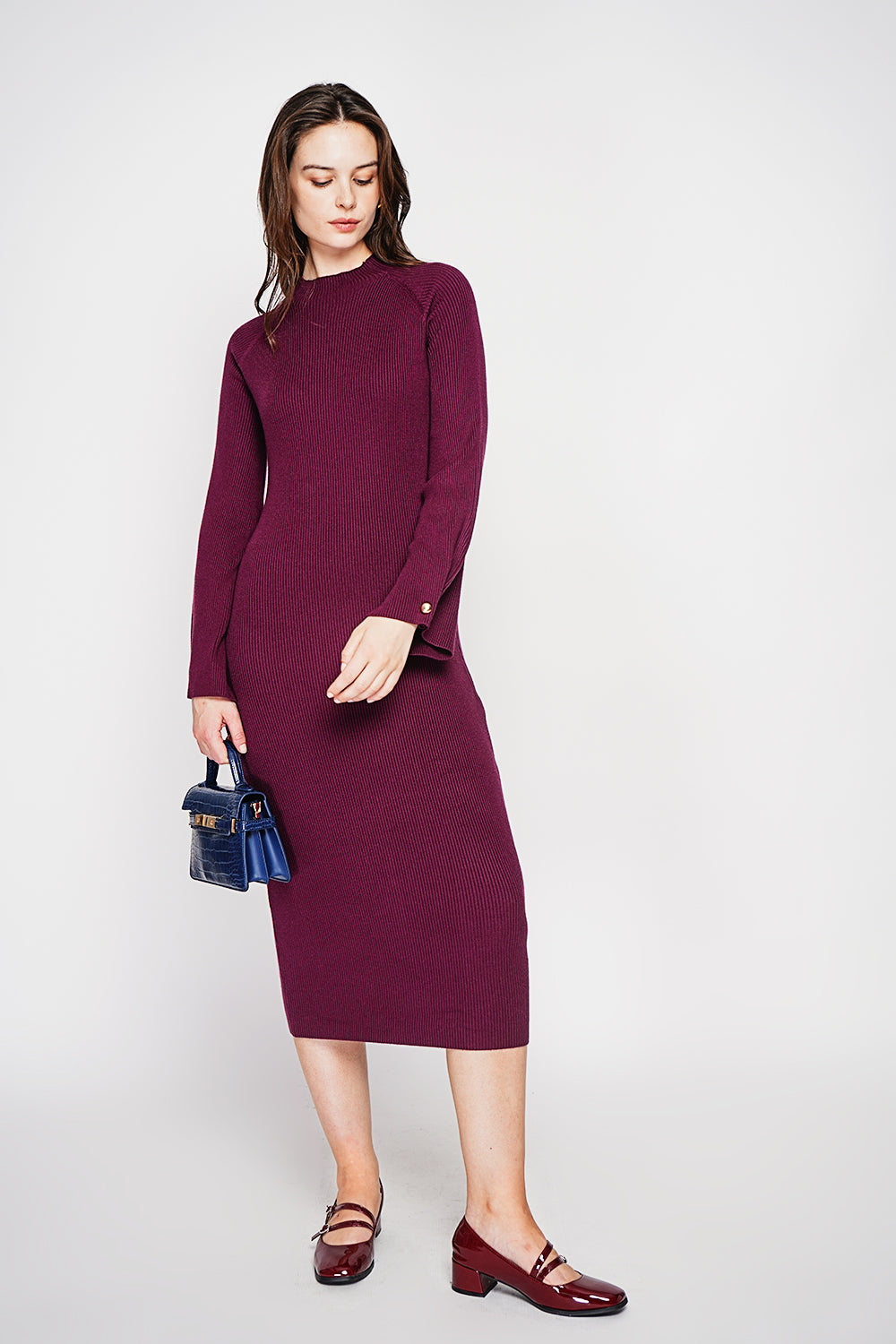 Ribbed high neck dress with buttoning on the long sleeves