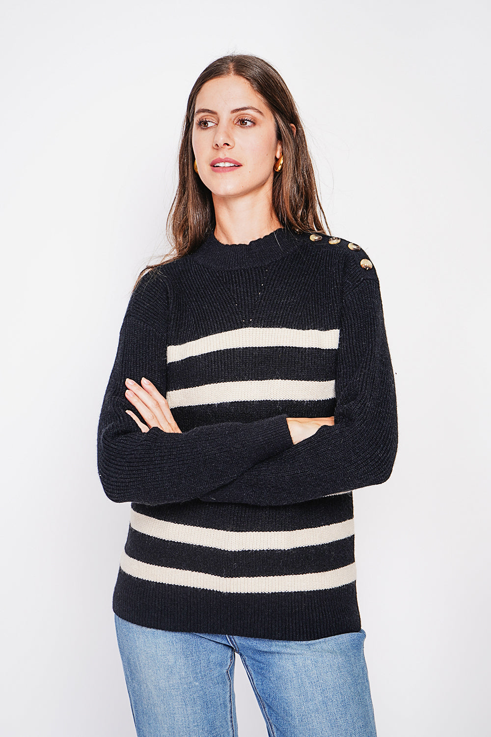 Openwork high neck sweater with buttoned shoulder and long sleeves