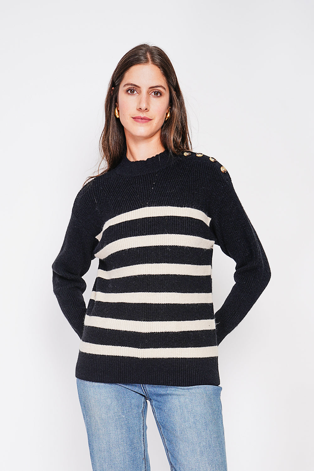 Openwork high neck sweater with buttoned shoulder and long sleeves