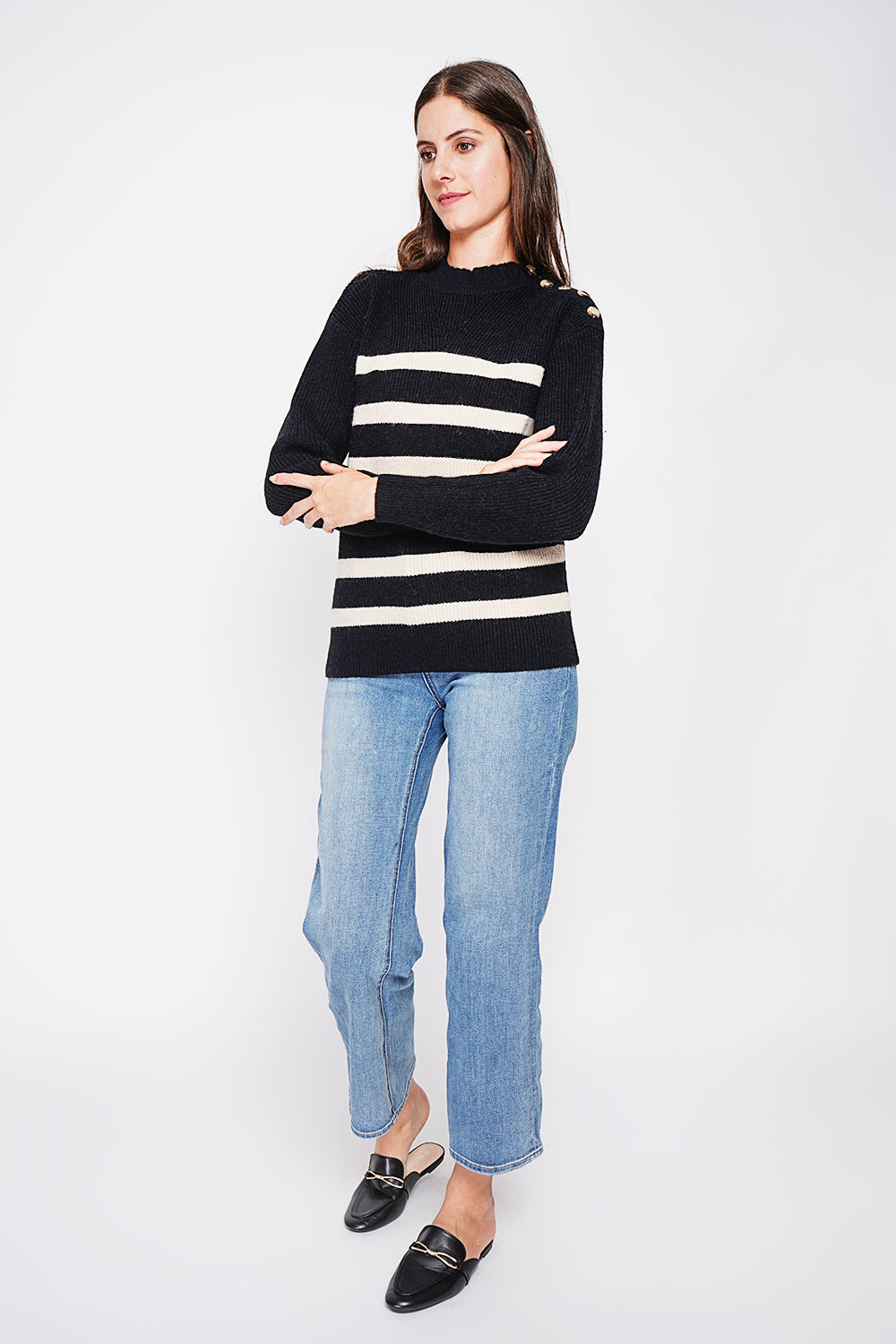 Openwork high neck sweater with buttoned shoulder and long sleeves