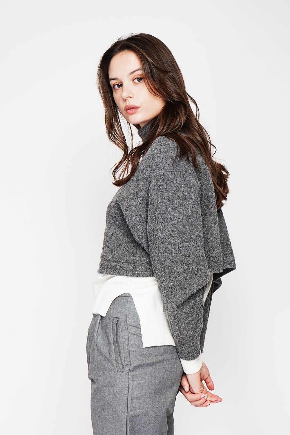 Short turtleneck poncho with long sleeves