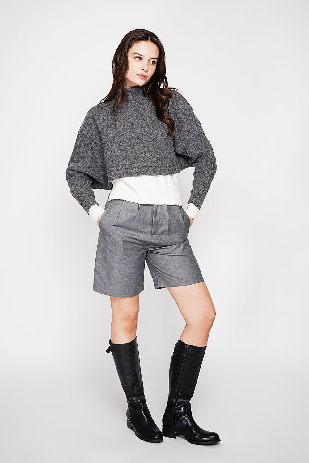 Short turtleneck poncho with long sleeves