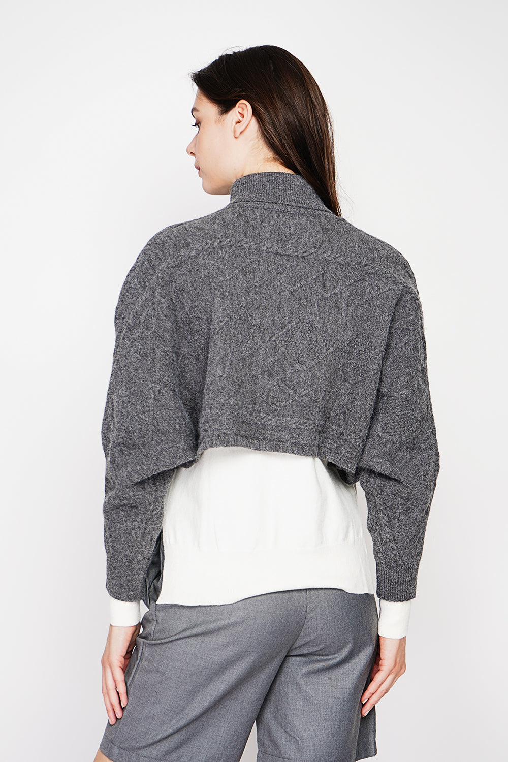 Short turtleneck poncho with long sleeves