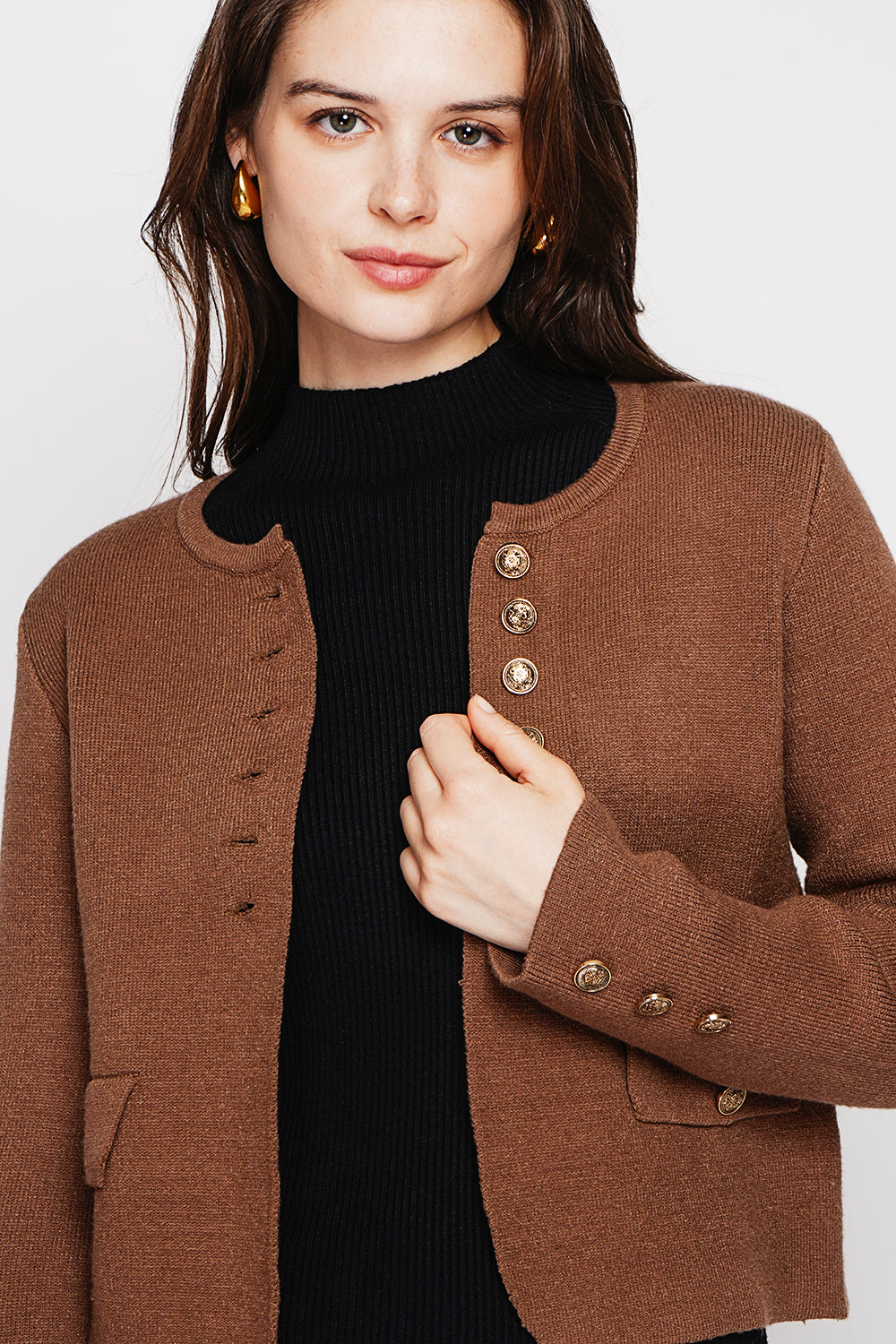Short fancy buttoned jacket with long sleeve flap