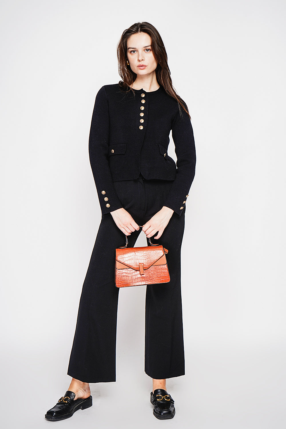 Short fancy buttoned jacket with long sleeve flap