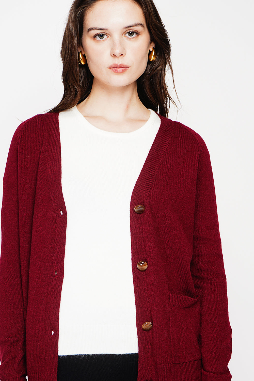 Fancy buttoned v-neck oversized fit vest with long sleeve pockets