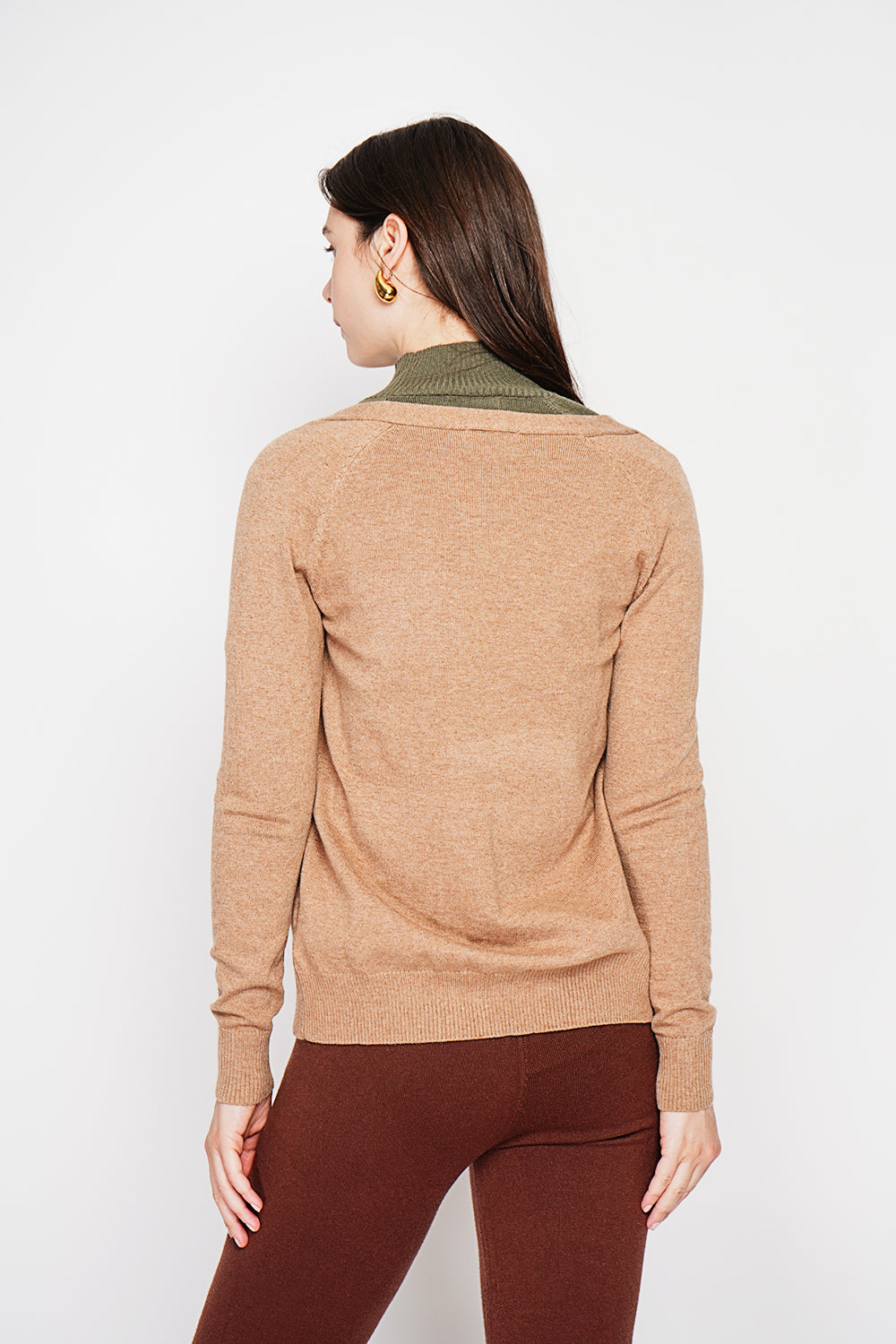 Fancy buttoned v-neck oversized fit vest with long sleeve pockets