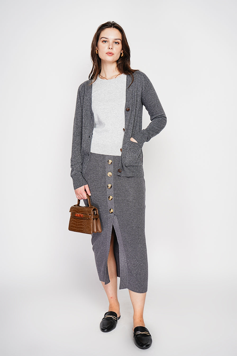 Fancy buttoned v-neck oversized fit vest with long sleeve pockets