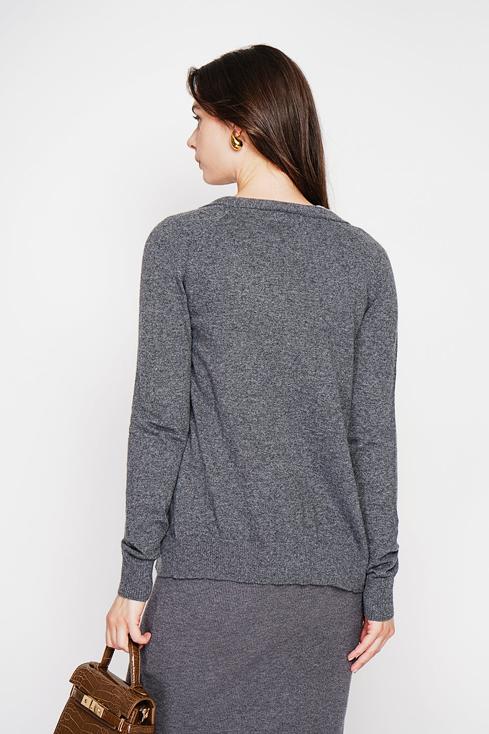 Fancy buttoned v-neck oversized fit vest with long sleeve pockets