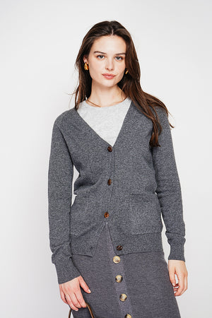 Fancy buttoned v-neck oversized fit vest with long sleeve pockets