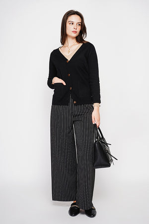 Fancy buttoned v-neck oversized fit vest with long sleeve pockets