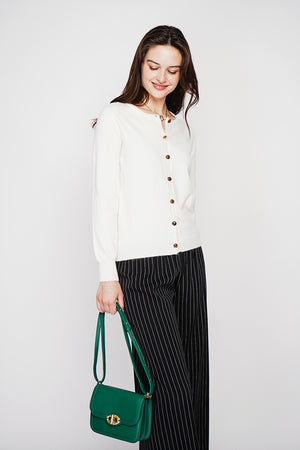 Fancy buttoned crew neck vest with long sleeves