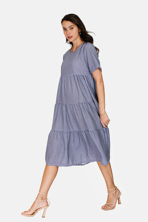 Babydoll cut gingham dress, closed back with mother-of-pearl buttons, short sleeves