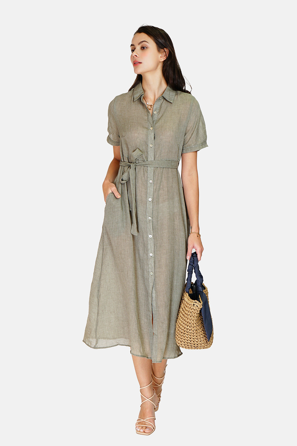 Shirt dress Buttoned in the front in a trapeze shape with thin strap inside