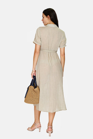 Shirt dress Buttoned in the front in a trapeze shape with thin strap inside