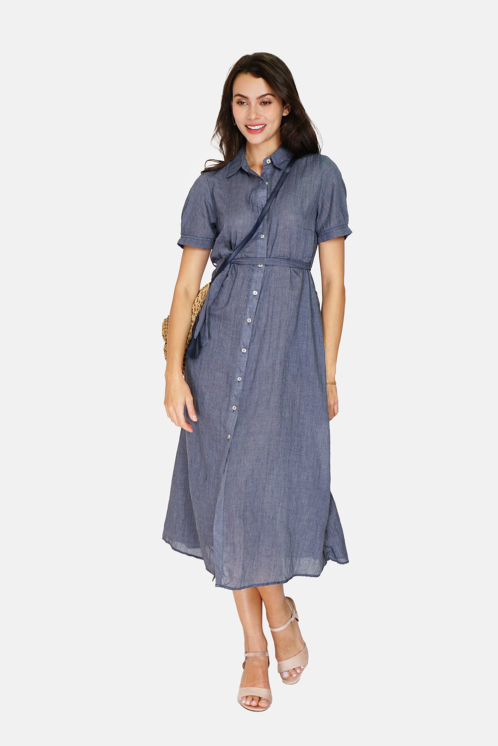 Shirt dress Buttoned in the front in a trapeze shape with thin strap inside