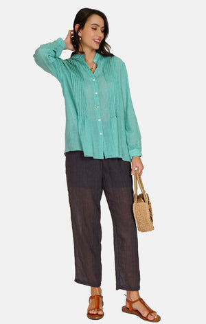 Tunic with mandarin collar, folded front, buttoned, long sleeves