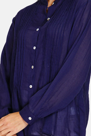 Tunic with mandarin collar, folded front, buttoned, long sleeves