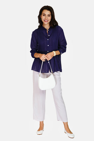 Tunic with mandarin collar, folded front, buttoned, long sleeves