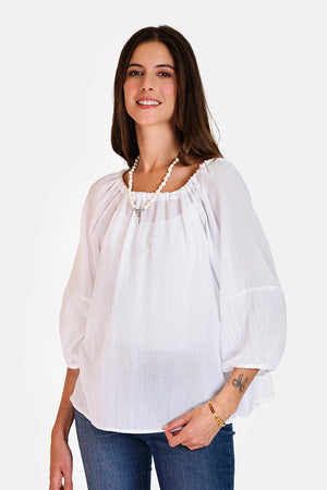 Wide top with lace at the round neck with 3/4 sleeves