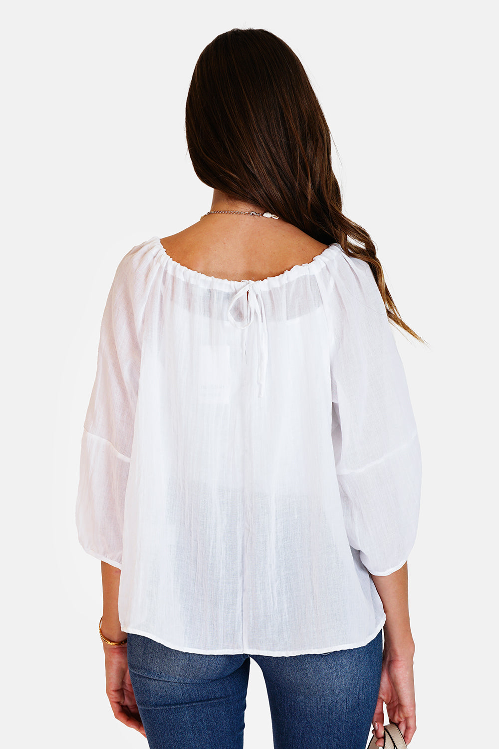 Wide top with lace at the round neck with 3/4 sleeves