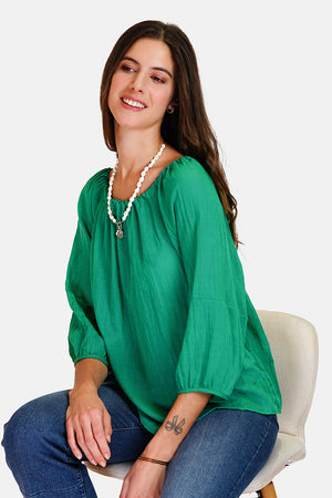 Wide top with lace at the round neck with 3/4 sleeves