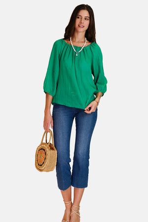 Wide top with lace at the round neck with 3/4 sleeves