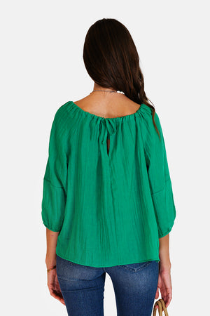 Wide top with lace at the round neck with 3/4 sleeves