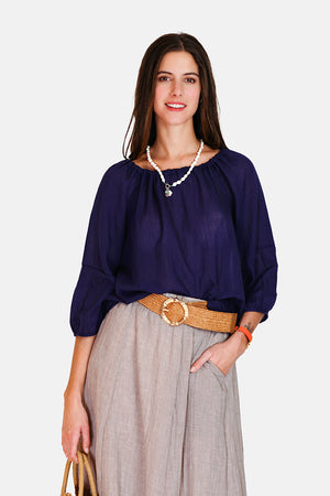 Wide top with lace at the round neck with 3/4 sleeves