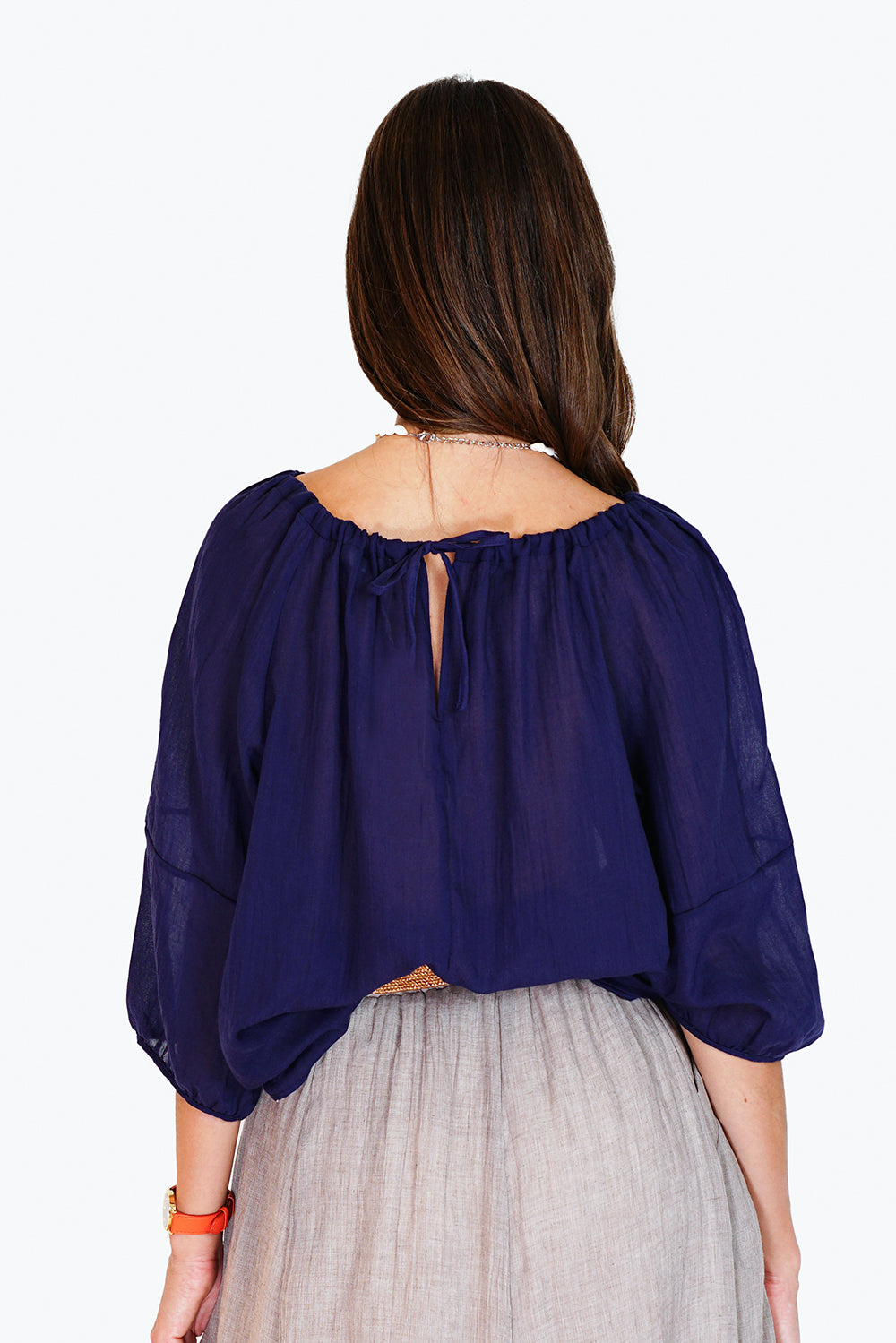 Wide top with lace at the round neck with 3/4 sleeves