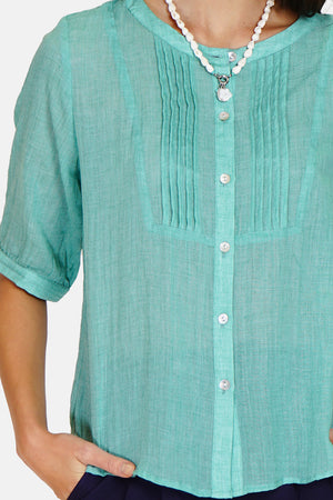 Round neck shirt, ribbed front with buttoned length sleeves