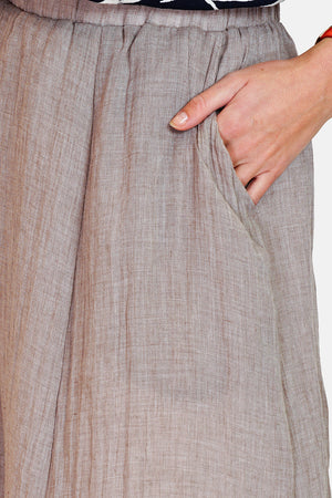 Long skirt with front pockets lined in bi-color