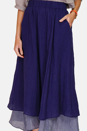 Long skirt with front pockets lined in bi-color