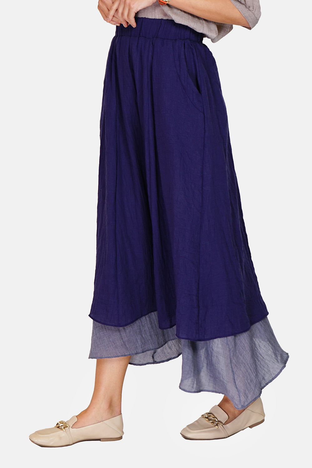 Long skirt with front pockets lined in bi-color