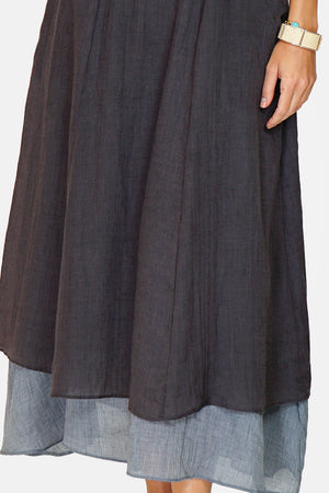 Long skirt with front pockets lined in bi-color