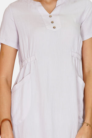 Dress with Tunisian collar, front buttons and pockets, short sleeves