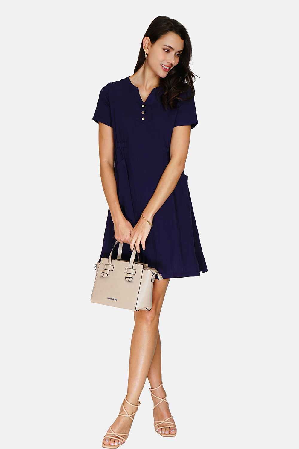 Dress with Tunisian collar, front buttons and pockets, short sleeves
