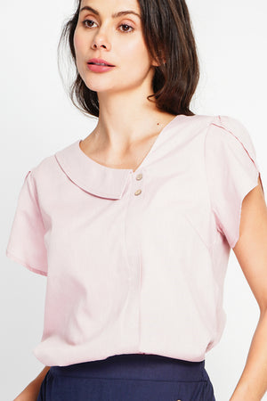 Top with flap collar, buttons on the front and short sleeves