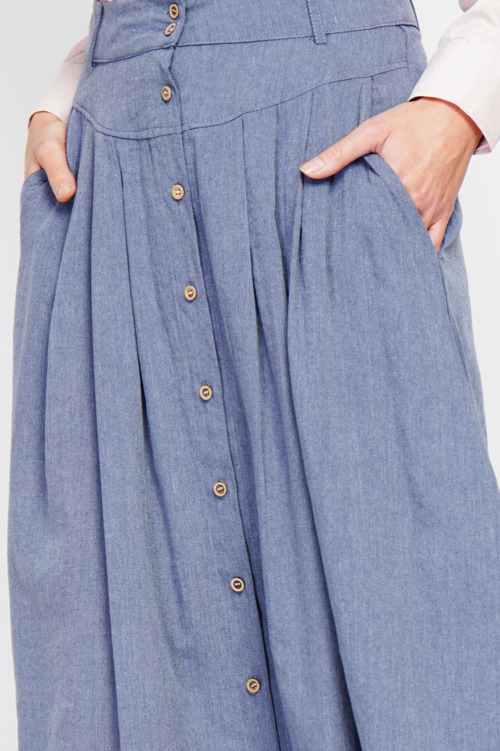 Long flared skirt with buttoned front and side pockets