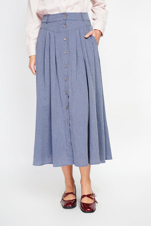 Long flared skirt with buttoned front and side pockets