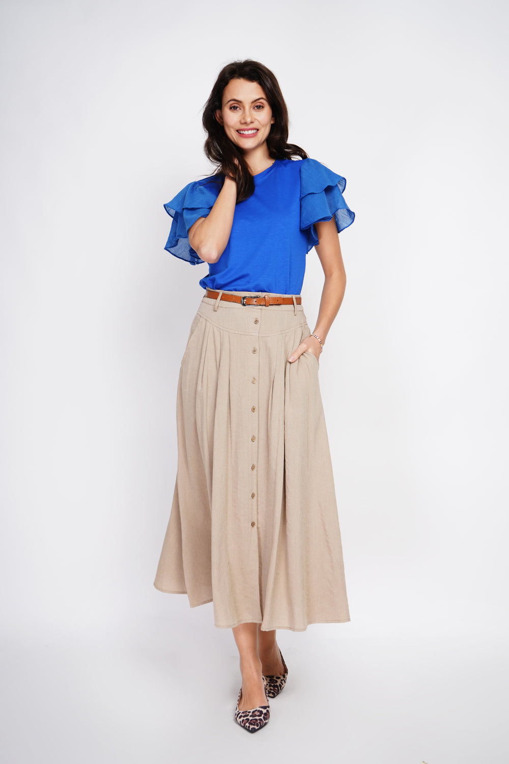 Long flared skirt with buttoned front and side pockets