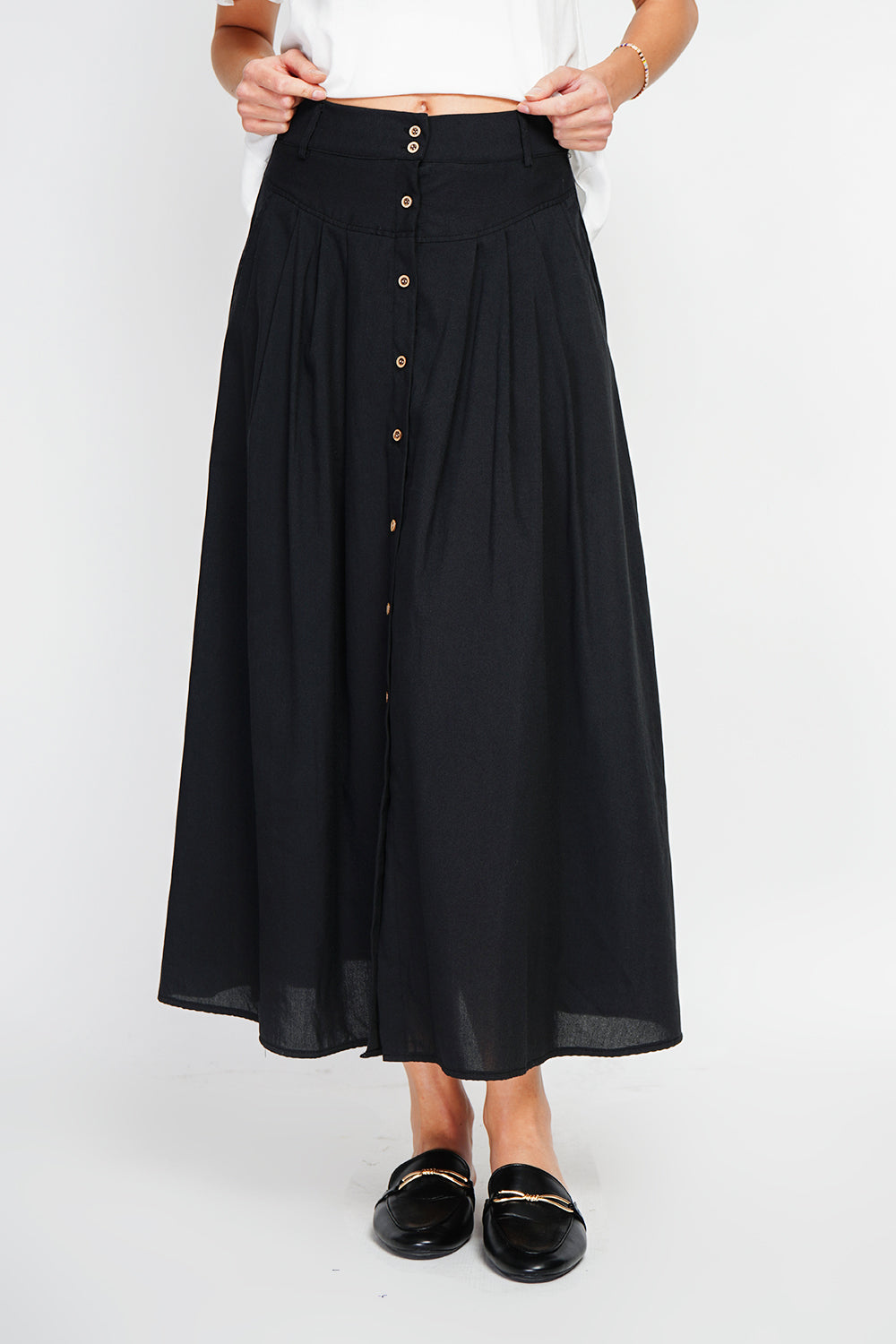 Long flared skirt with buttoned front and side pockets