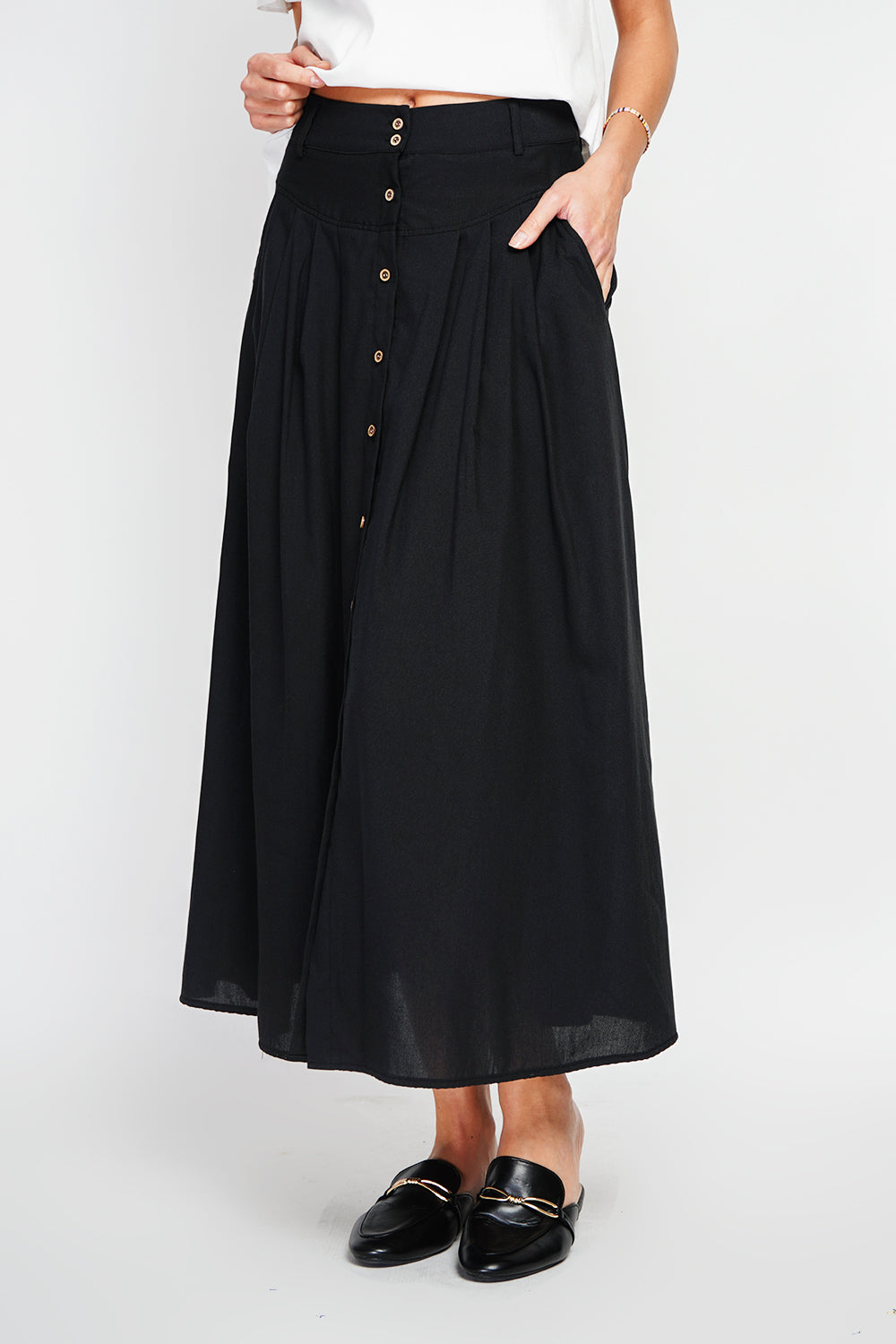 Long flared skirt with buttoned front and side pockets