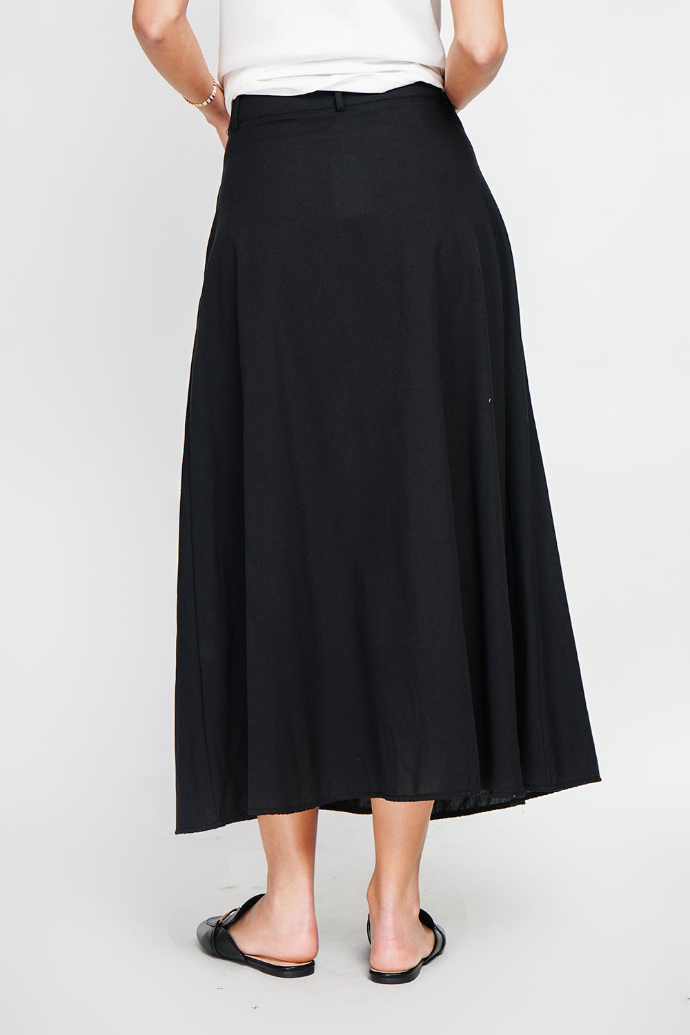 Long flared skirt with buttoned front and side pockets